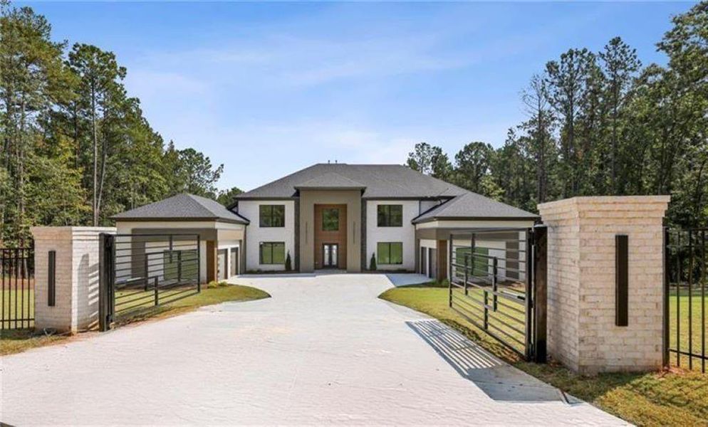 Front exterior of a new home in , Buford, GA, highlighting curb appeal (Image 28).