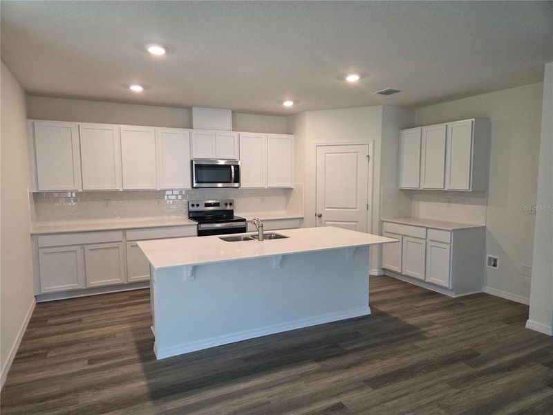 Furnished interior view inside a new home in Wexford Cove, Ormond Beach (Image 3).