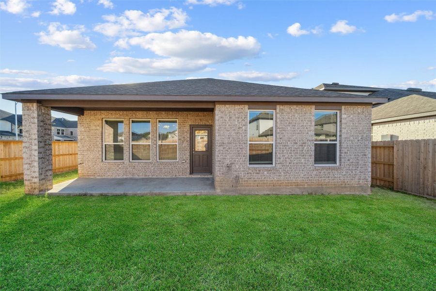 Front exterior of a new home in Lago Mar, Texas City, TX, highlighting curb appeal (Image 18). Front exterior of a new home in Lago Mar, Texas City, TX, highlighting curb appeal (Image 18).
