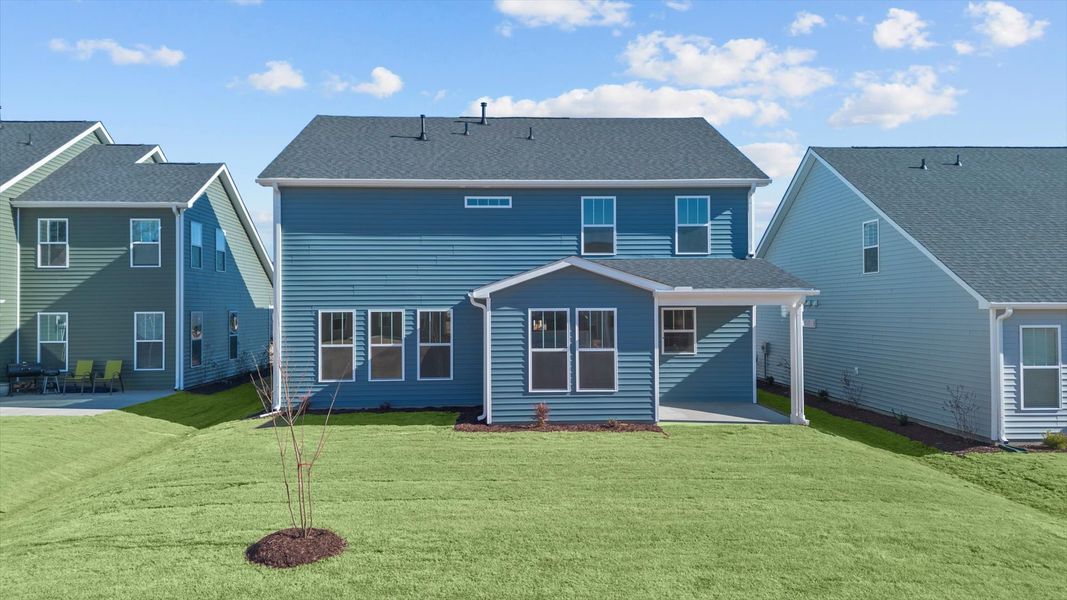 Warm and inviting outdoor living space with a covered rear porch and tasteful finishes Warm and inviting outdoor living space with a covered rear porch and tasteful finishes