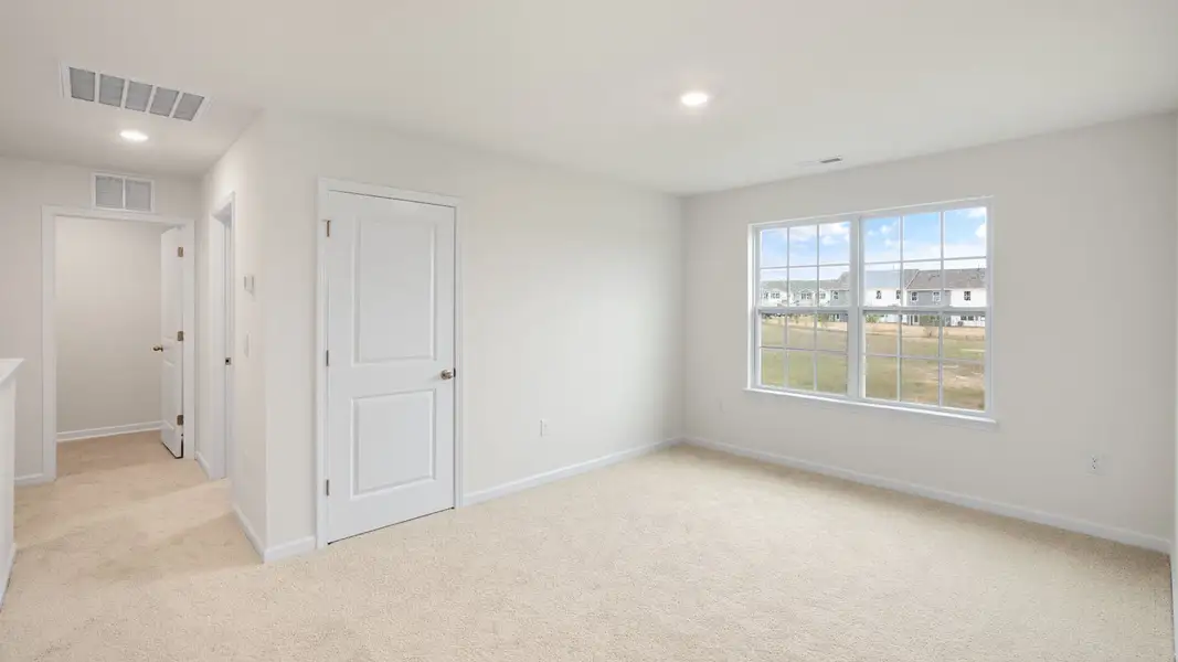 Spacious, unfurnished interior of a new home in The Reserve at Prestleigh, Wake Forest (Image 26).