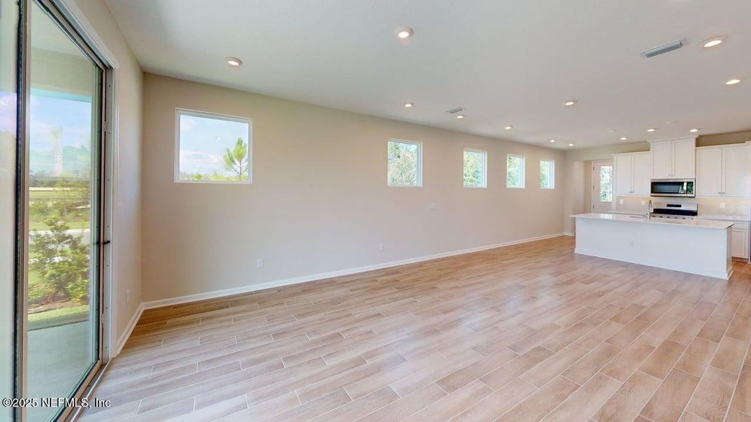 Spacious, unfurnished interior of a new home in RiverTown - WaterSong, St. Johns (Image 16).