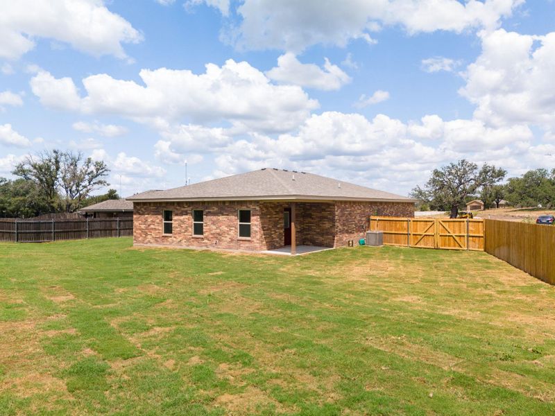 Exterior details and patio area of a home in , Lampasas (Image 17).