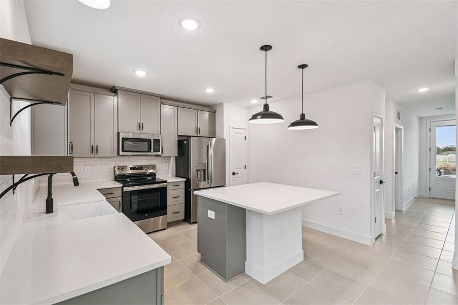 Furnished interior view inside a new home in Aspire at Canter Creek, Davenport (Image 13).