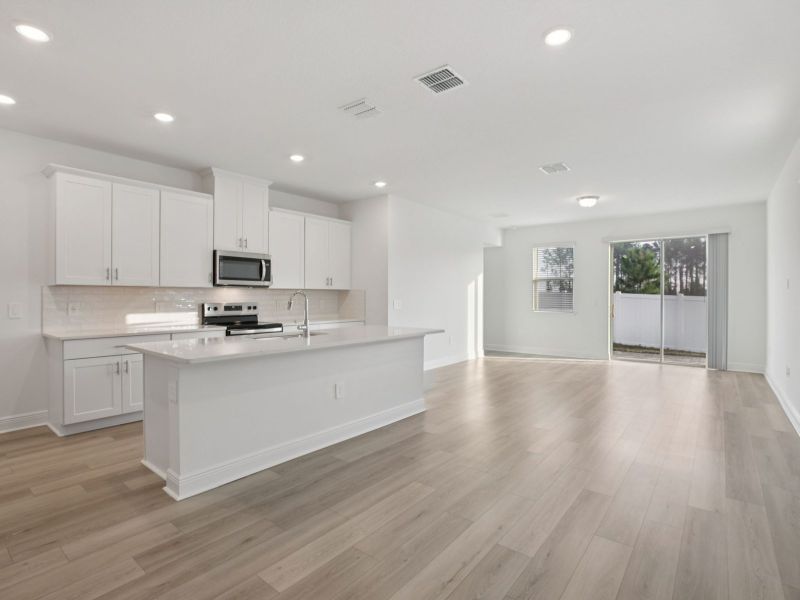 Furnished interior view inside a new home in Cyrene at Minneola - Villas, Minneola (Image 3). Furnished interior view inside a new home in Cyrene at Minneola - Villas, Minneola (Image 3).