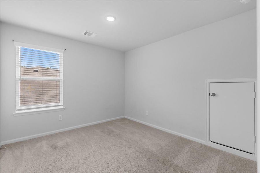 Spacious, unfurnished interior of a new home in Lakes at Black Oak, Magnolia (Image 18).