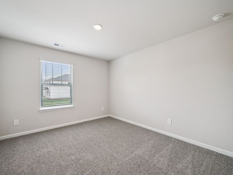 Spacious, unfurnished interior of a new home in Vines at Mill Creek - Estate Series, Braselton (Image 21).