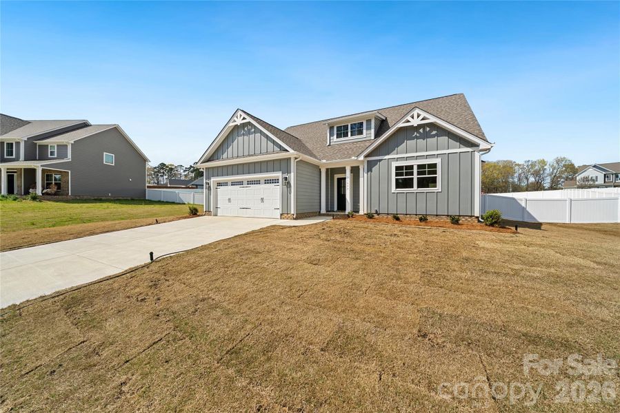 Front exterior of a new home in , Stanfield, NC, highlighting curb appeal (Image 19).