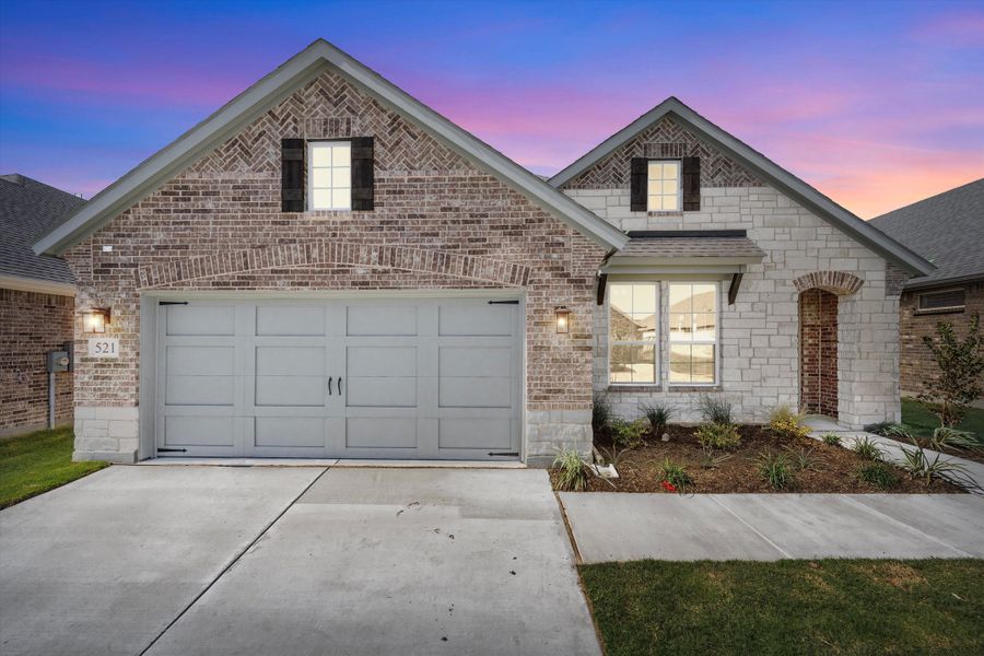 Front exterior of a new home in Morningstar, Aledo, TX, highlighting curb appeal (Image 1).