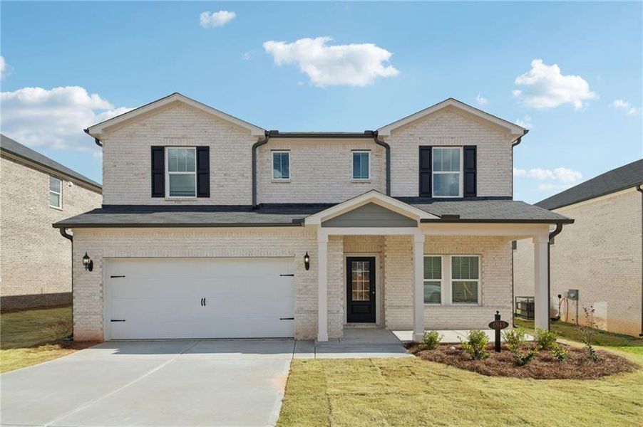 Front exterior of a new home in Creekside at Oxford Park, Fairburn, GA, highlighting curb appeal (Image 28).