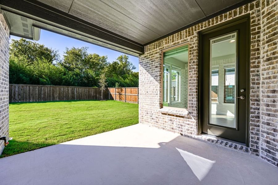 Exterior details and patio area of a home in South Oak 50s, Oak Point (Image 2). Exterior details and patio area of a home in South Oak 50s, Oak Point (Image 2).