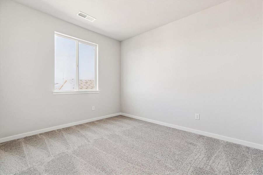 Spacious, unfurnished interior of a new home in Floret Collection at Alder Creek, Parker (Image 17).
