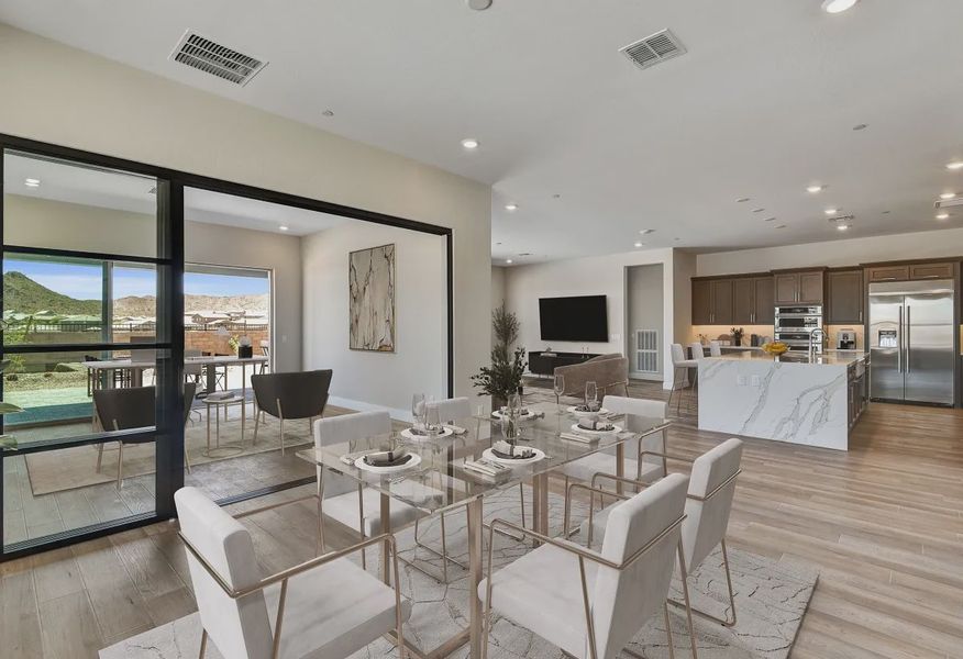 Virtually Staged Ridgecrest Costa Homesite 105 Dining Kitchen - 1 of 20