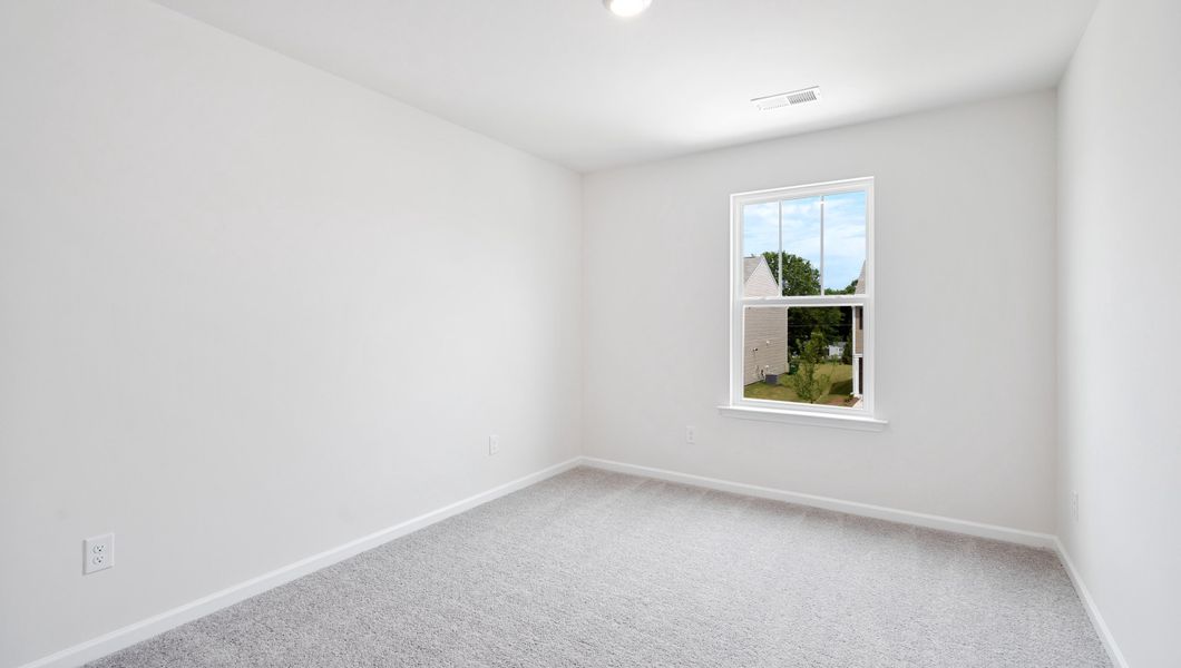Representative unfurnished interior of a home built from the AISLE by D.R. Horton in Harrier Point, Woodruff (Image 14).