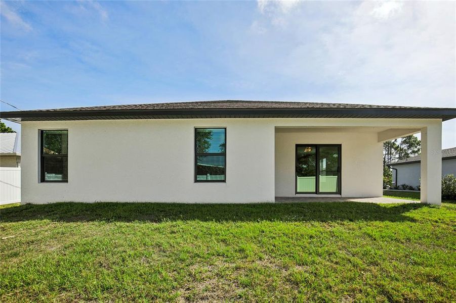 Exterior details and patio area of a home in , Port Charlotte (Image 26).