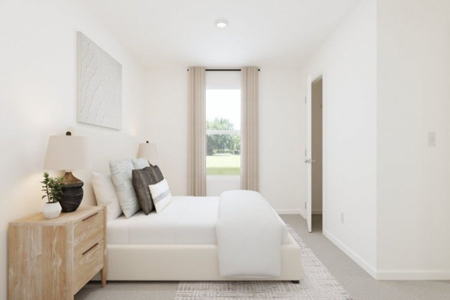 A living room with a white couch. A living room with a white couch.