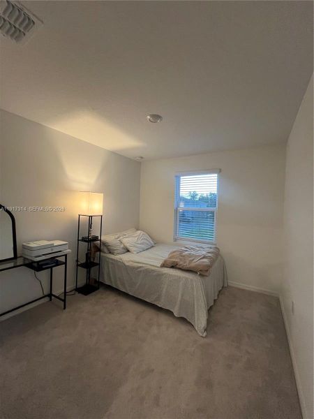 Furnished interior view inside a new home in The Townhomes at Bellalago, Kissimmee (Image 4).