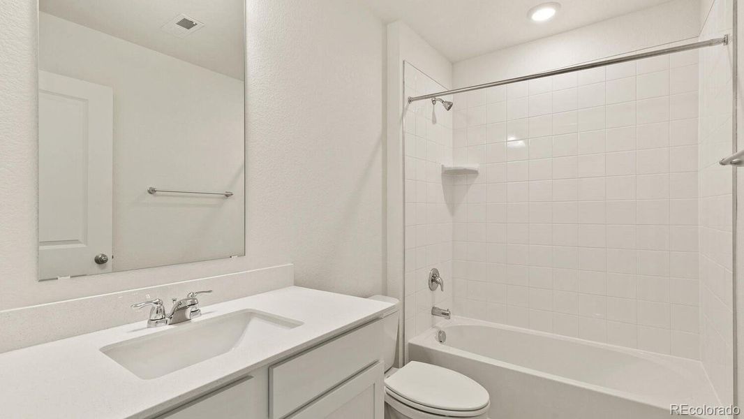 Furnished interior view inside a new home in The Ridge at Lorson Ranch, Colorado Springs (Image 6).