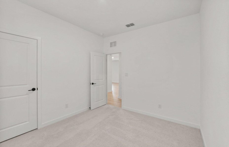 Spacious, unfurnished interior of a new home in Sunfield, Buda (Image 17). Spacious, unfurnished interior of a new home in Sunfield, Buda (Image 17).