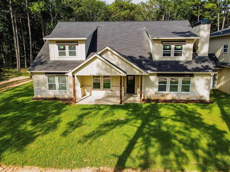 Front exterior of a new home in , Athens, TX, highlighting curb appeal (Image 26). Front exterior of a new home in , Athens, TX, highlighting curb appeal (Image 26).