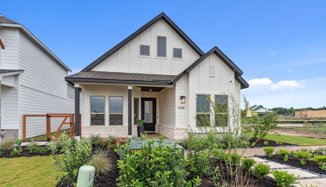 Front exterior of a new home in The Crossvine, Schertz, TX, highlighting curb appeal (Image 20).