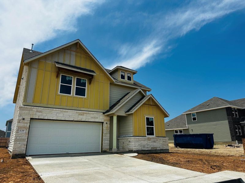 Front exterior of a new home in Patterson Ranch, Georgetown, TX, highlighting curb appeal (Image 8).