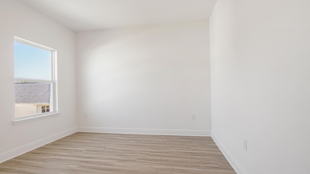 Spacious, unfurnished interior of a new home in Bayside at Ward Creek, Panama City Beach (Image 29).