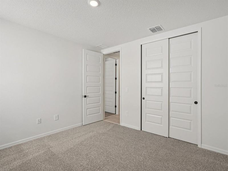 Spacious, unfurnished interior of a new home in Oakfield Trails - Signature Series, Parrish (Image 20). Spacious, unfurnished interior of a new home in Oakfield Trails - Signature Series, Parrish (Image 20).