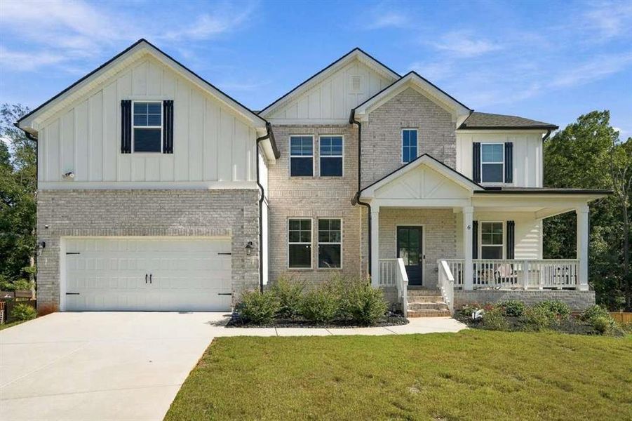Front exterior of a new home in , Senoia, GA, highlighting curb appeal (Image 1). Front exterior of a new home in , Senoia, GA, highlighting curb appeal (Image 1).