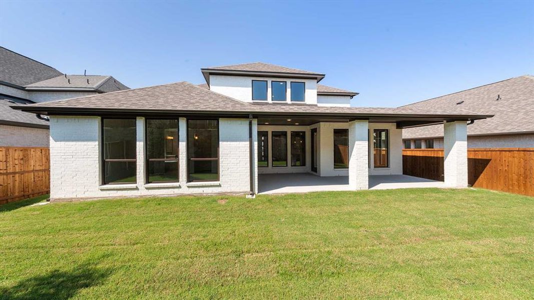 Front exterior of a new home in The Heights At Uptown Celina 50', Celina, TX, highlighting curb appeal (Image 1).