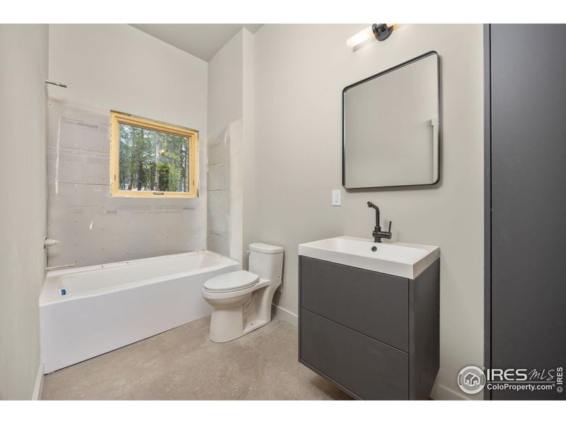 Bath #2 located in Bedroom #2 - tile in tub surround to be white square tile Bath #2 located in Bedroom #2 - tile in tub surround to be white square tile
