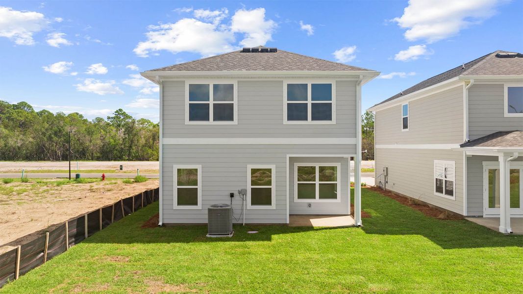 Exterior details and patio area of a home in Colonial East, Panama City Beach (Image 2). Exterior details and patio area of a home in Colonial East, Panama City Beach (Image 2).