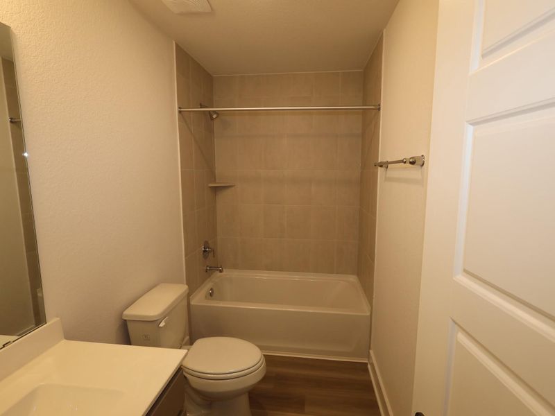 Furnished interior view inside a new home in Lone Star Landing, Montgomery (Image 16).