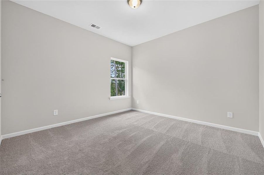 Spacious, unfurnished interior of a new home in Glen at Cave Springs, Douglasville (Image 26).