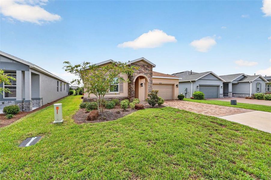 Front exterior of a new home in , Ocala, FL, highlighting curb appeal (Image 24).