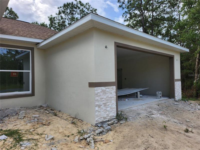 Front exterior of a new home in , Ocala, FL, highlighting curb appeal (Image 2). Front exterior of a new home in , Ocala, FL, highlighting curb appeal (Image 2).
