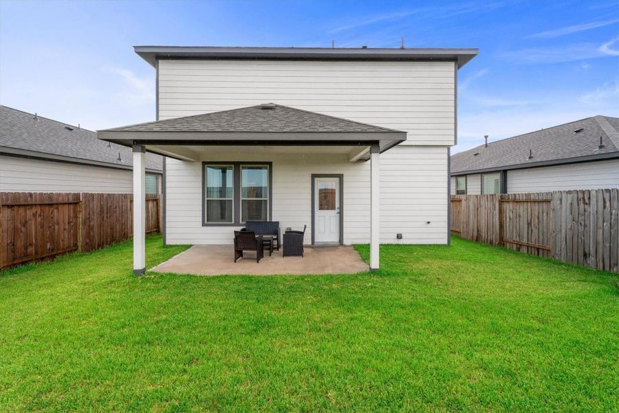 Exterior details and patio area of a home in Bluestem, Brookshire (Image 28). Exterior details and patio area of a home in Bluestem, Brookshire (Image 28).