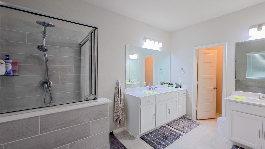 Furnished interior view inside a new home in Sunterra, Katy (Image 5).