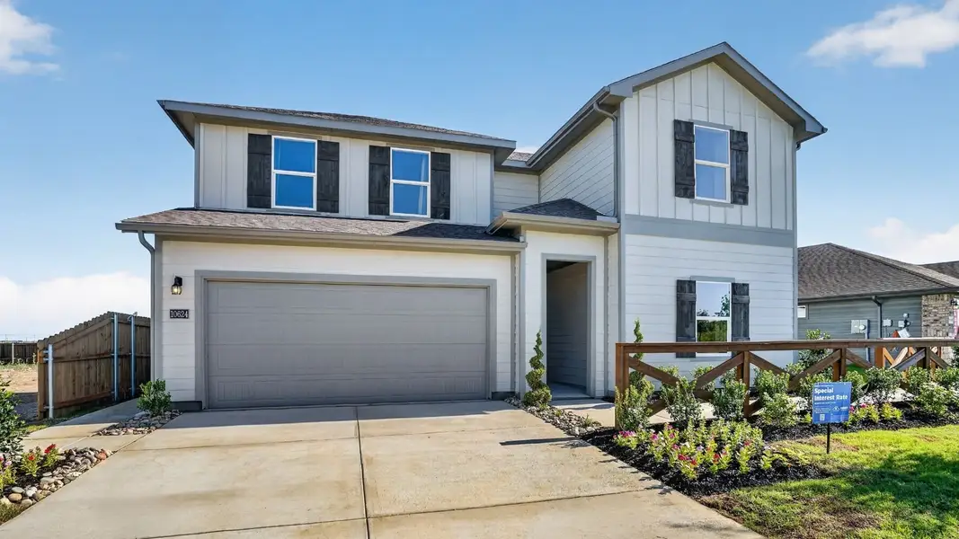 Representative exterior photo of a completed home built from the Ozark by D.R. Horton in Rock Creek West, Fort Worth, TX (Image 25).