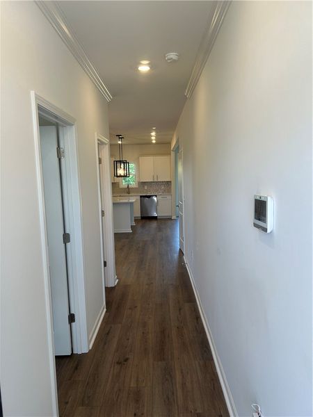 This living space features warm wood flooring and