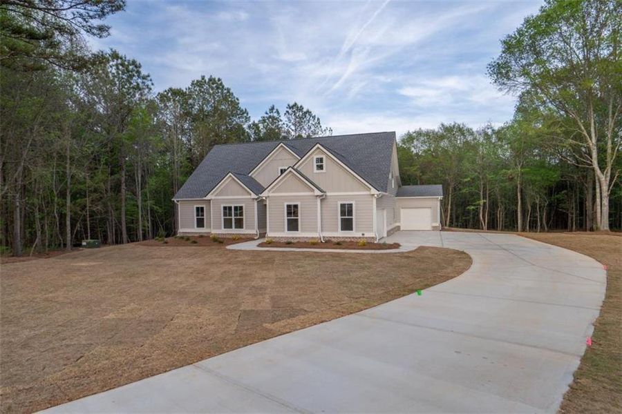 Front exterior of a new home in , Social Circle, GA, highlighting curb appeal (Image 22).