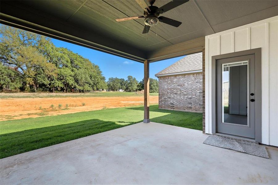 View of patio featuring a ceiling fan View of patio featuring a ceiling fan