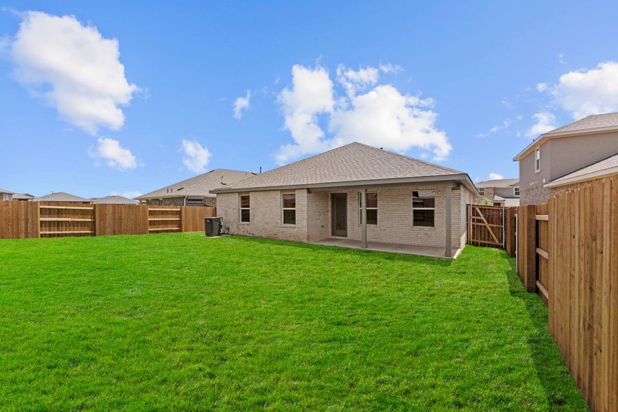 Exterior details and patio area of a home in Bar W Ranch, Leander (Image 18).