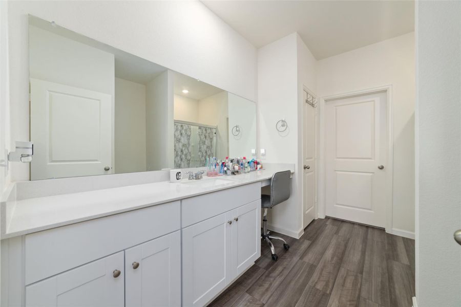 Furnished interior view inside a new home in Sunterra, Katy (Image 12).