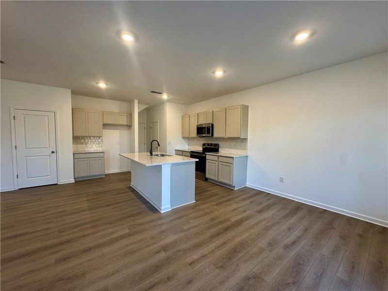 Furnished interior view inside a new home in Eastlyn Crossing, Flowery Branch (Image 8).