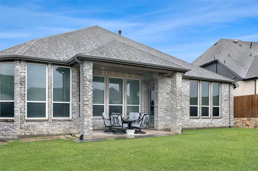 Exterior details and patio area of a home in , Van Alstyne (Image 27).