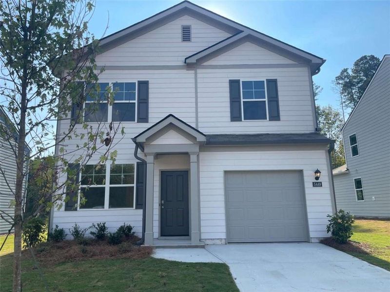 Front exterior of a new home in Sherwood Manor, South Fulton, GA, highlighting curb appeal (Image 1). Front exterior of a new home in Sherwood Manor, South Fulton, GA, highlighting curb appeal (Image 1).