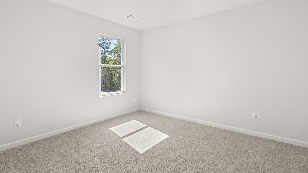 Representative unfurnished interior of a home built from the Halton by D.R. Horton in Liberty Crossing, Braselton (Image 30).
