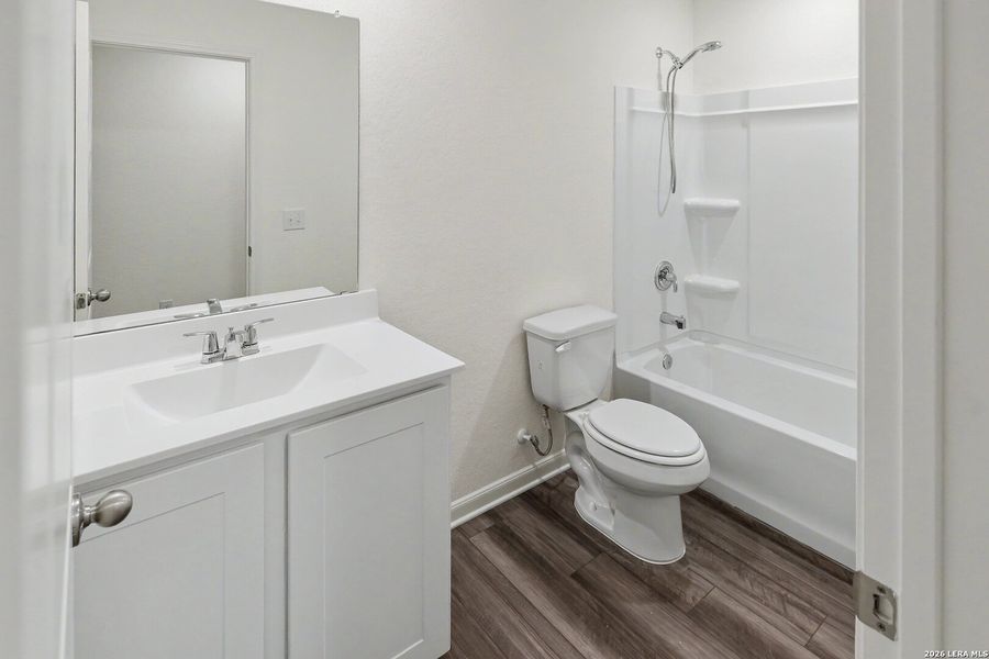 Furnished interior view inside a new home in Hennersby Hollow, San Antonio (Image 9).