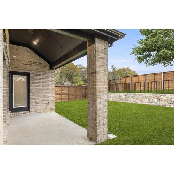 Exterior details and patio area of a home in Solterra, Mesquite (Image 4).